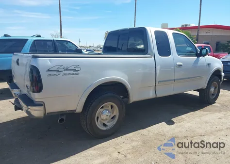 2000 Ford F-150 Lariat/Work Series/Xl/Xlt z USA, uszkodzony, nr VIN 1FTRX18L9YNB43776